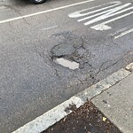 Pothole at 258–268 Harvard St