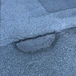 Pothole at 145–195 Lawton St