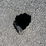 Pothole at 64–98 Edgehill Rd