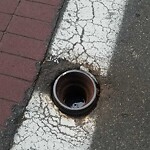 Pothole at Allerton Overlook, 203 Pond Ave