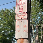 Damaged Sign at 78 Monmouth St