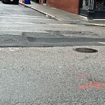 Pothole at 83–99 Harvard Square