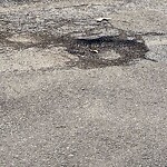 Pothole at 60 Evans Rd