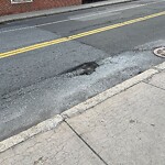 Pothole at 11 Longwood Ave