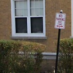 Damaged Sign at 341 Saint Paul St