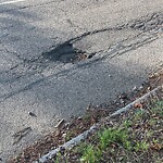 Pothole at 2–28 Independence Dr, Chestnut Hill