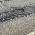 Pothole at 219 Grove St, Chestnut Hill