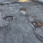 Pothole at 2–40 Regent Cir